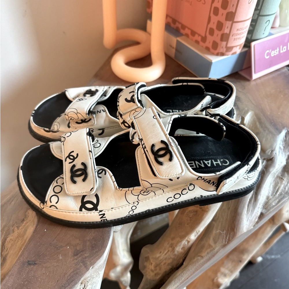 Black and white Chanel sandals